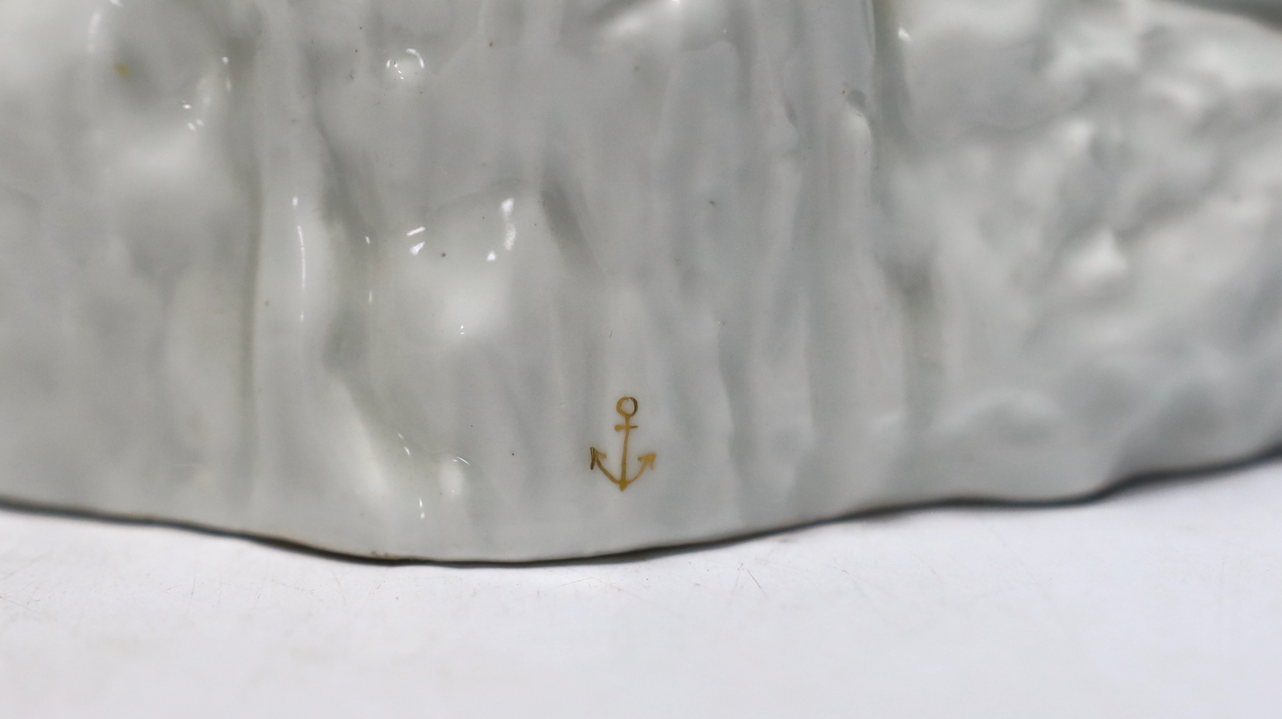 A pair of late 19th century Samson figural porcelain candle holders, 26cm
